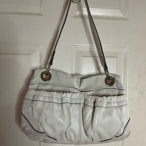 Clarks leather off white shoulder bag with bold silver tone hardwares.